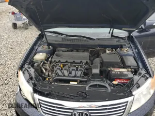 2010 Kia Optima LX z VIN KNAGG4A80A5398981, wystawiony jako Copart lot #59092515 z przebiegiem 153 524 mil mil oraz Szkoda całkowita • Salvage title. Historia ofert i sprzedaży dostępna na DreamBid. Obrazek 11.