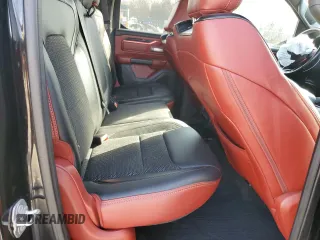 2019 Ram 1500 Rebel z VIN 1C6SRFET5KN580766, wystawiony jako Copart lot #54126805 z przebiegiem 129 515 mil mil oraz Szkoda całkowita • Salvage title. Historia ofert i sprzedaży dostępna na DreamBid. Obrazek 10.