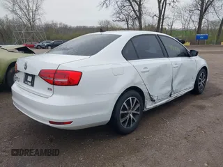 2015 Volkswagen Jetta Sedan 1.8T SE with VIN 3VWD17AJ4FM350619, listed as a IAAI auction lot 41917719 with 135,561 mi miles. Bid and sale history available at carsss.com. Image 4.