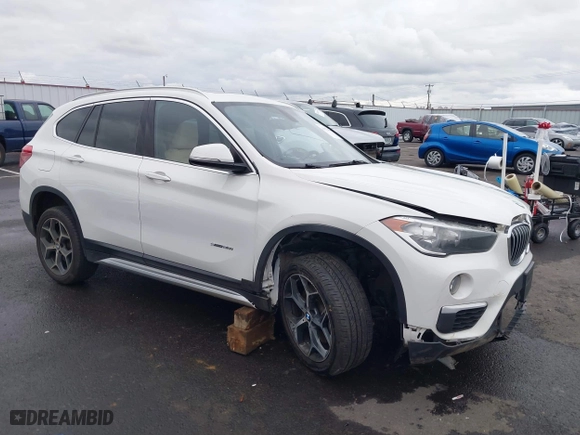 2018 BMW X1 sDrive28i with VIN WBXHU7C32J5H44246, listed as a IAAI auction lot 41477050 with 69,858 mi miles. Bid and sale history available at carsss.com. Image 1.