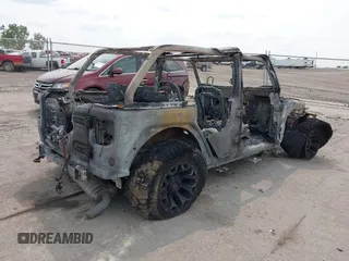 2021 Jeep Wrangler Unlimited Freedom with VIN 1C4HJXDN8MW765099, listed as a IAAI auction lot 42394438 with Not provided miles and . Bid and sale history available at DreamBid. Image 4.