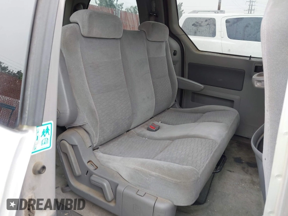 2005 Ford Freestar SE z VIN 2FMZA516X5BA42620, wystawiony jako IAAI lot #42163183 z przebiegiem 93 141 mil mil oraz . Historia ofert i sprzedaży dostępna na DreamBid. Obrazek 8.