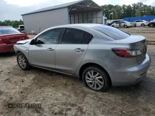 2013 Mazda 3 i Touring z VIN JM1BL1V7XD1766278, wystawiony jako Copart lot #60024815 z przebiegiem 143 490 mil mil oraz Szkoda całkowita • Salvage title. Historia ofert i sprzedaży dostępna na DreamBid. Obrazek 2.