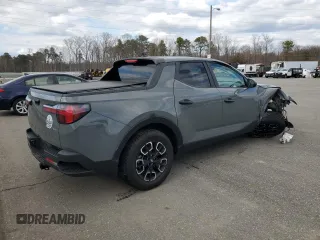 2022 Hyundai Santa Cruz SEL z VIN 5NTJBDAEXNH028481, wystawiony jako Copart lot #50438445 z przebiegiem Nie podano mil oraz Szkoda całkowita • Salvage title. Historia ofert i sprzedaży dostępna na DreamBid. Obrazek 3.