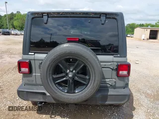 2020 Jeep Wrangler Unlimited Freedom with VIN 1C4HJXDG2LW186027, listed as a IAAI auction lot 42449664 with 87,869 mi miles and . Bid and sale history available at DreamBid. Image 16.