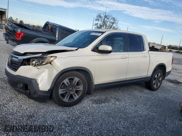 2019 Honda Ridgeline RTL-T with VIN 5FPYK2F63KB002874, listed as a Copart auction lot 42230235 with 127,158 mi miles and Non repairable. Bid and sale history available at DreamBid. Image 1.