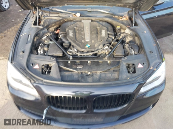 2015 BMW 7 Series 750Li xDrive with VIN WBAYF8C52FD654892, listed as a IAAI auction lot 41368616 with 158,140 mi miles. Bid and sale history available at carsss.com. Image 10.