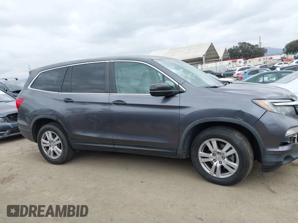2016 Honda Pilot LX with VIN 5FNYF5H14GB037205, listed as a IAAI auction lot 42034018 with 101,943 mi miles and . Bid and sale history available at DreamBid. Image 13.