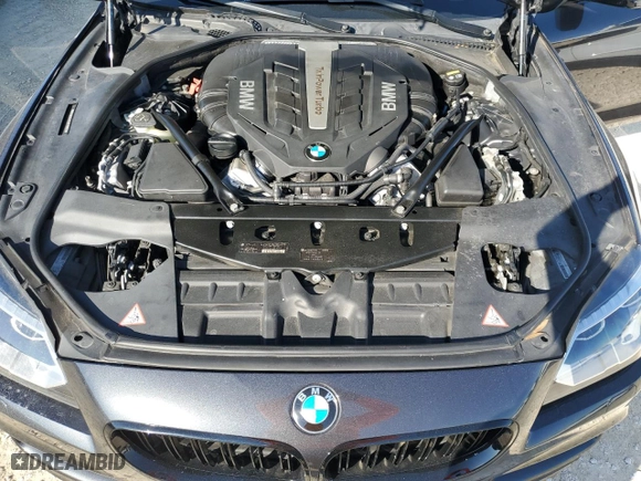 2015 BMW 6 Series 650i with VIN WBA6B2C58FD799063, listed as a Copart auction lot 77819914 with 0 mi miles and Salvage Title. Bid and sale history available at carsss.com. Image 11.