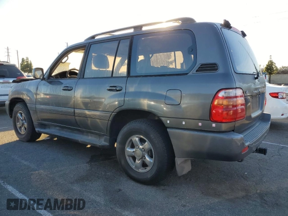 1999 Toyota Land Cruiser with VIN JT3HT05J3X0026246, listed as a Copart auction lot 81826974 with 0 mi miles and Salvage Title. Bid and sale history available at carsss.com. Image 2.