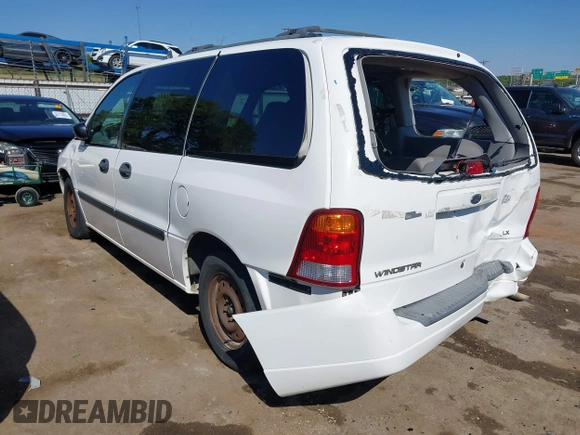2002 Ford Windstar GL with VIN 2FMDA51442BB28784, listed as a IAAI auction lot 40236485 with 73,137 mi miles and . Bid and sale history available at carsss.com. Image 3.