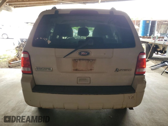 2010 Ford Escape Hybrid z VIN 1FMCU4K32AKA08232, wystawiony jako Copart lot #55356045 z przebiegiem 118 496 mil mil oraz Szkoda całkowita • Salvage title. Historia ofert i sprzedaży dostępna na DreamBid. Obrazek 6.