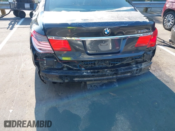 2012 BMW 7 Series 750Li with VIN WBAKB8C59CC963228, listed as a IAAI auction lot 42625772 with 136,751 mi miles and . Bid and sale history available at DreamBid. Image 6.