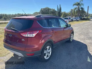 2013 Ford Escape SE with VIN 1FMCU9G95DUD25554, listed as a Copart auction lot 83068844 with Not provided miles and Clean title. Bid and sale history available at DreamBid. Image 4.