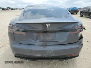 2021 Tesla Model S Long Range with VIN 5YJSA1E51MF453924, listed as a Copart auction lot 53486495 with 48,599 mi miles and Salvage title. Bid and sale history available at DreamBid. Image 6.