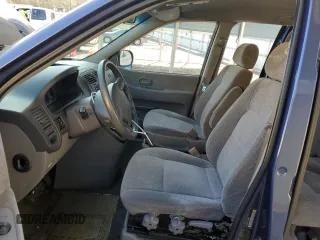 2003 Kia Sedona LX with VIN KNDUP131736448714, listed as a Copart auction lot 82308764 with 91,073 mi miles and Salvage Title. Bid and sale history available at carsss.com. Image 7.