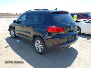 2015 Volkswagen Tiguan SE with VIN WVGAV7AX1FW558855, listed as a IAAI auction lot 42064427 with 58,584 mi miles and . Bid and sale history available at DreamBid. Image 3.