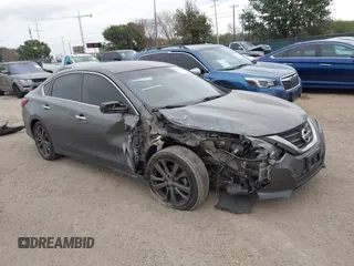 2018 Nissan Altima SV with VIN 1N4AL3AP9JC256152, listed as a IAAI auction lot 41359670 with 136,686 mi miles and . Bid and sale history available at carsss.com. Image 1.