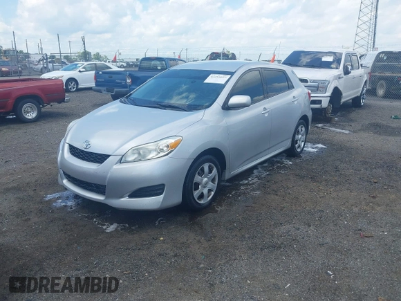 2009 Toyota Matrix z VIN 2T1KU40E89C100754, wystawiony jako IAAI lot #42255027 z przebiegiem 123 769 mil mil oraz . Historia ofert i sprzedaży dostępna na DreamBid. Obrazek 2.