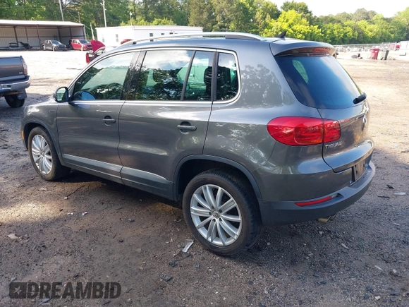 2013 Volkswagen Tiguan S with VIN WVGAV3AX7DW624136, listed as a IAAI auction lot 42256657 with 124,000 mi miles and . Bid and sale history available at DreamBid. Image 3.