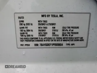 2023 Tesla Model Y Performance with VIN 7SAYGDEF1PF809654, listed as a Copart auction lot 43981915 with 16,401 mi miles and Salvage Title. Bid and sale history available at DreamBid. Image 13.