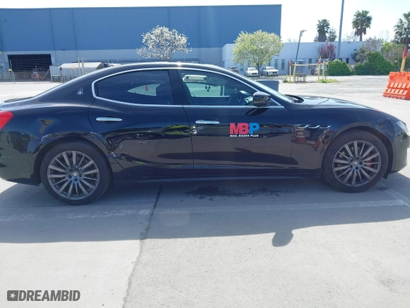 2019 Maserati Ghibli with VIN ZAM57XSA5K1328183, listed as a IAAI auction lot 41970101 with 61,260 mi miles. Bid and sale history available at carsss.com. Image 13.