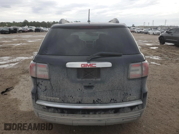 2014 GMC Acadia SLT z VIN 1GKKRRKDXEJ124821, wystawiony jako Copart lot #50989945 z przebiegiem 125 355 mil mil oraz Szkody całkowita. Historia ofert i sprzedaży dostępna na DreamBid. Obrazek 6.