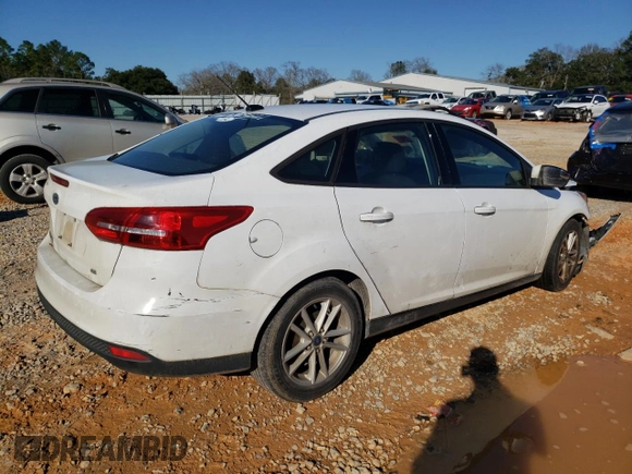 2018 Ford Focus SE with VIN 1FADP3F23JL220312, listed as a Copart auction lot 46903995 with 128,549 mi miles and Salvage Title. Bid and sale history available at carsss.com. Image 3.