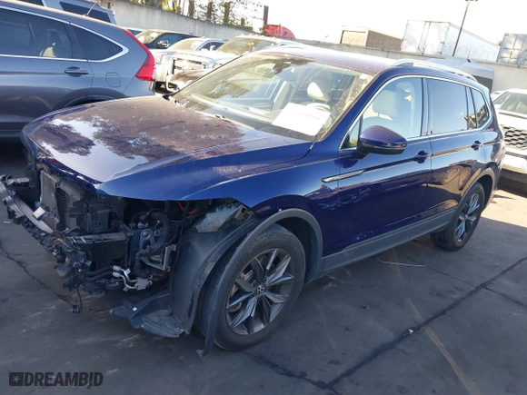 2022 Volkswagen Tiguan SE with VIN 3VV3B7AX5NM128462, listed as a IAAI auction lot 41668066 with 25,113 mi miles. Bid and sale history available at carsss.com. Image 2.