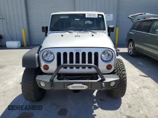 2012 Jeep Wrangler Unlimited Call of Duty MW3 with VIN 1C4BJWFG9CL199551, listed as a Copart auction lot 57097555 with 43,651 mi miles and Salvage title. Bid and sale history available at DreamBid. Image 5.
