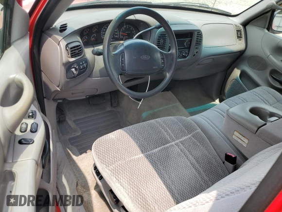 1997 Ford F-150 XL with VIN 1FTEX17L1VNB55769, listed as a Copart auction lot 58901715 with 174,234 mi miles and Salvage title. Bid and sale history available at DreamBid. Image 8.