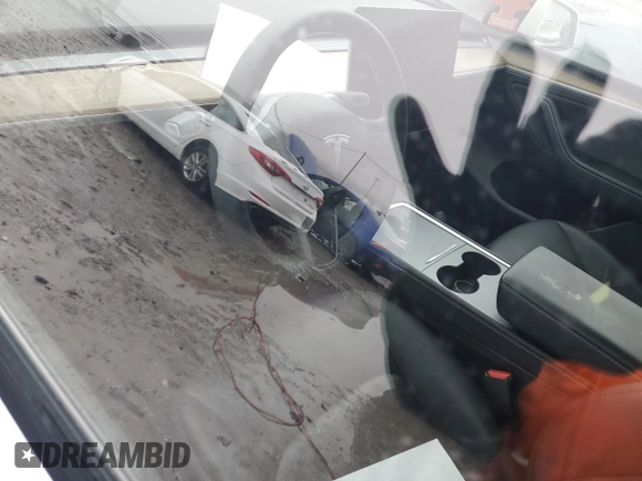 2023 Tesla Model Y Long Range z VIN 7SAYGDEE1PA114563, wystawiony jako Copart lot #44423505 z przebiegiem Nie podano mil oraz Szkody całkowita. Historia ofert i sprzedaży dostępna na DreamBid. Obrazek 8.