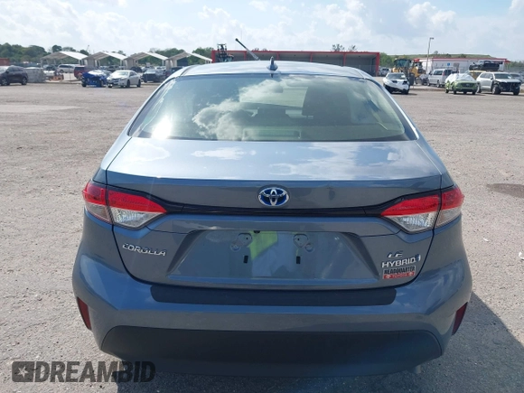 2023 Toyota Corolla Hybrid LE with VIN JTDBCMFE8PJ010693, listed as a IAAI auction lot 41736641 with 10,751 mi miles. Bid and sale history available at carsss.com. Image 17.