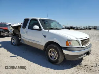 2002 Ford F-150 XL with VIN 1FTRX17W82NA64876, listed as a Copart auction lot 50013045 with 256,345 mi miles and Salvage Title. Bid and sale history available at carsss.com. Image 4.