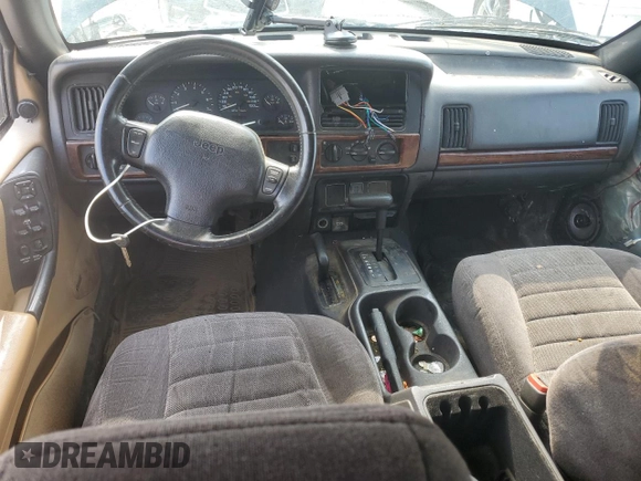 1997 Jeep Grand Cherokee Laredo with VIN 1J4GZ58SXVC595012, listed as a Copart auction lot 59746655 with Not provided miles and Salvage title. Bid and sale history available at DreamBid. Image 8.