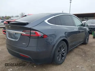 2019 Tesla Model X 75D with VIN 5YJXCDE24KF152150, listed as a IAAI auction lot 42015311 with 1 mi miles. Bid and sale history available at carsss.com. Image 4.