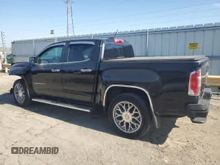 2021 GMC Canyon 4WD Denali with VIN 1GTG6EEN4M1221938, listed as a Copart auction lot 48760965 with 63,231 mi miles and Salvage Title. Bid and sale history available at carsss.com. Image 2.