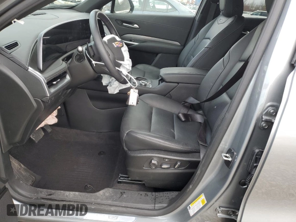 2024 Cadillac XT4 AWD Premium Luxury with VIN 1GYFZDR40RF123637, listed as a Copart auction lot 46852195 with 5,001 mi miles and Salvage title. Bid and sale history available at DreamBid. Image 7.