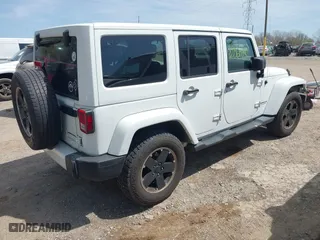 2012 Jeep Wrangler Unlimited Sahara with VIN 1C4HJWEG3CL254944, listed as a IAAI auction lot 42060981 with 172,358 mi miles. Bid and sale history available at carsss.com. Image 4.