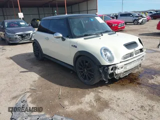 2006 MINI Hardtop S with VIN WMWRE335X6TL19914, listed as a IAAI auction lot 41680041 with 213,011 mi miles and . Bid and sale history available at DreamBid. Image 1.