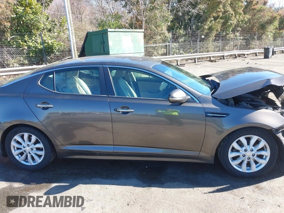 2014 Kia Optima EX z VIN 5XXGN4A78EG320367, wystawiony jako IAAI lot #41858824 z przebiegiem 216 987 mil mil oraz . Historia ofert i sprzedaży dostępna na DreamBid. Obrazek 13.
