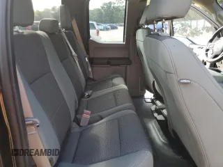 2018 Ford F-150 XL with VIN 1FTEX1CB0JFB12963, listed as a Copart auction lot 51076365 with 107,086 mi miles and Salvage Title. Bid and sale history available at carsss.com. Image 10.