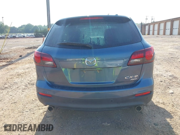 2014 Mazda CX-9 Touring with VIN JM3TB3CV7E0435659, listed as a IAAI auction lot 42428247 with 124,523 mi miles and . Bid and sale history available at DreamBid. Image 16.
