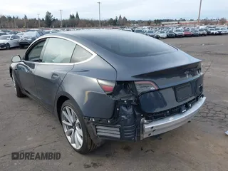 2018 Tesla Model 3 Long Range Battery with VIN 5YJ3E1EB9JF097118, listed as a IAAI auction lot 41619510 with 64,132 mi miles and . Bid and sale history available at DreamBid. Image 3.