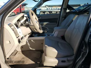2010 Mercury Mariner Hybrid with VIN 4M2CN2K3XAKJ00771, listed as a Copart auction lot 82979364 with 203,594 mi miles and Salvage Title. Bid and sale history available at carsss.com. Image 7.