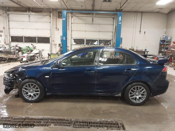 2013 Mitsubishi Lancer SE with VIN JA32V2FW9DU005616, listed as a IAAI auction lot 41247087 with 129,055 mi miles. Bid and sale history available at carsss.com. Image 14.