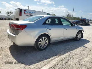 2012 Lincoln MKZ z VIN 3LNHL2GC4CR800578, wystawiony jako Copart lot #58409215 z przebiegiem 49 423 mil mil oraz Szkody całkowita. Historia ofert i sprzedaży dostępna na DreamBid. Obrazek 3.