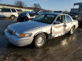 2002 Mercury Grand Marquis LS Premium z VIN 2MEFM75W72X659538, wystawiony jako Copart lot #83198474 z przebiegiem 115 296 mil mil oraz Szkody całkowita. Historia ofert i sprzedaży dostępna na DreamBid. Obrazek 1.