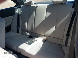 2015 BMW 2 Series M235i with VIN WBA1J7C59FV254140, listed as a IAAI auction lot 41642427 with 23,957 mi miles and . Bid and sale history available at carsss.com. Image 8.
