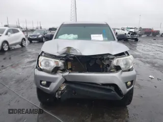 2014 Toyota Tacoma with VIN 3TMLU4EN2EM161239, listed as a IAAI auction lot 41536944 with 136,299 mi miles. Bid and sale history available at carsss.com. Image 12.